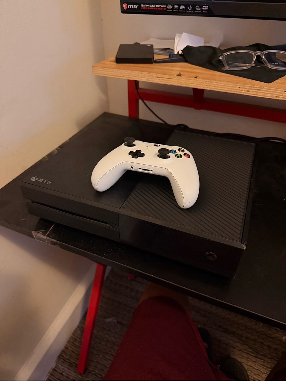 Microsoft Xbox One black console with white wireless controller